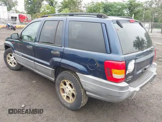 2002 Jeep Grand Cherokee Sport с VIN 1J4GW38S42C166263, выставлен на аукционе IAAI как лот 42521707 с пробегом 267 842 миль миль и . История ставок и продаж доступна на DreamBid. Изображение 3.