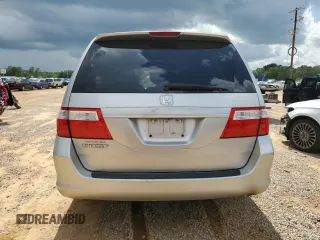 2006 Honda Odyssey EX-L z VIN 5FNRL387X6B458818, wystawiony jako Copart lot #61801335 z przebiegiem 227 179 mil mil oraz Czysty tytuł • Clean title. Historia ofert i sprzedaży dostępna na DreamBid. Obrazek 6.