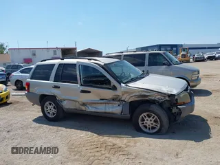 2004 Jeep Grand Cherokee Laredo z VIN 1J4GW48SX4C283922, wystawiony jako IAAI lot #42306869 z przebiegiem 263 812 mil mil oraz . Historia ofert i sprzedaży dostępna na DreamBid. Obrazek 12.
