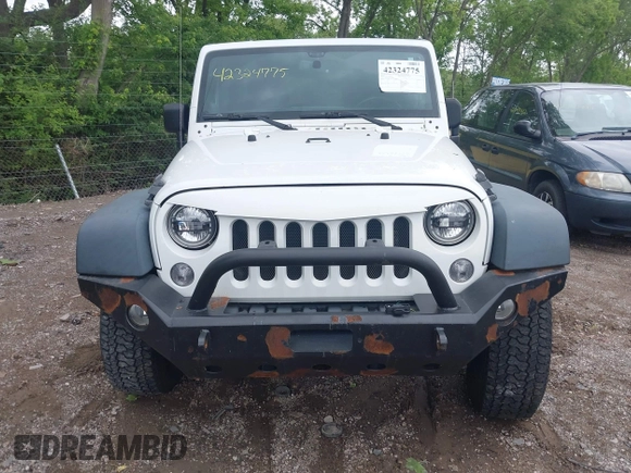 2014 Jeep Wrangler Unlimited Sport with VIN 1C4BJWDG9EL135077, listed as a IAAI auction lot 42324775 with 104,221 mi miles and . Bid and sale history available at DreamBid. Image 12.