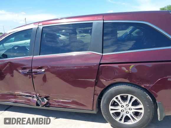 2011 Honda Odyssey EX-L with VIN 5FNRL5H60BB094647, listed as a IAAI auction lot 42223712 with 202,612 mi miles and . Bid and sale history available at carsss.com. Image 14.