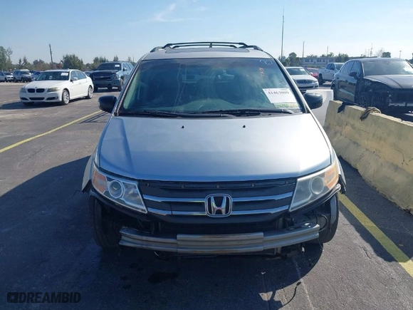 2012 Honda Odyssey Touring with VIN 5FNRL5H90CB066469, listed as a IAAI auction lot 41463009 with NaN miles. Bid and sale history available at carsss.com. Image 6.
