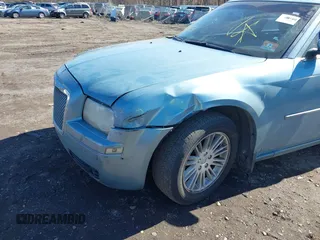 2009 Chrysler 300 LX with VIN 2C3KA43D19H552759, listed as a IAAI auction lot 41702989 with 172,572 mi miles. Bid and sale history available at carsss.com. Image 6.