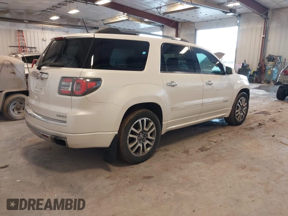 2014 GMC Acadia Denali with VIN 1GKKVTKD1EJ351419, listed as a IAAI auction lot 41728881 with 245,672 mi miles and . Bid and sale history available at carsss.com. Image 4.