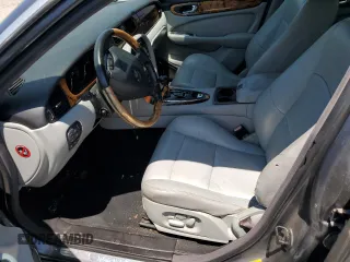 2004 Jaguar XJ with VIN SAJWA73B64TG18784, listed as a Copart auction lot 81254734 with 0 mi miles and Clean Title. Bid and sale history available at carsss.com. Image 7.