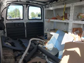 2014 Chevrolet Express Cargo Van with VIN 1GCSGAFX2E1151373, listed as a IAAI auction lot 42045528 with 123,718 mi miles. Bid and sale history available at carsss.com. Image 8.