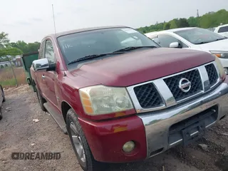 2004 Nissan Titan SE with VIN 1N6AA06A94N545539, listed as a IAAI auction lot 42036468 with 212,269 mi miles. Bid and sale history available at carsss.com. Image 1.