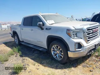2021 GMC Sierra 1500 SLT z VIN 3GTU9DET5MG100193, wystawiony jako IAAI lot #35827484 z przebiegiem 20 405 mil mil oraz . Historia ofert i sprzedaży dostępna na DreamBid. Obrazek 1.