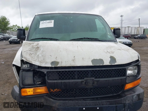 2012 Chevrolet Express Cargo with VIN 1GCWGFFA8C1108597, listed as a IAAI auction lot 42323808 with 200,965 mi miles and . Bid and sale history available at DreamBid. Image 6.