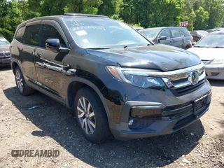 2019 Honda Pilot EX-L with VIN 5FNYF6H52KB006469, listed as a IAAI auction lot 42103135 with 12,757 mi miles and . Bid and sale history available at DreamBid. Image 1.