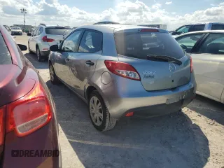 2014 Mazda 2 Sport with VIN JM1DE1KY6E0189739, listed as a Copart auction lot 76468914 with 107,164 mi miles and Salvage Title. Bid and sale history available at carsss.com. Image 2.