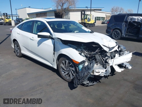 2018 Honda Civic EX with VIN 2HGFC2F71JH502564, listed as a IAAI auction lot 41933157 with 56,696 mi miles and . Bid and sale history available at DreamBid. Image 1.