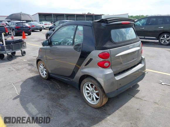 2009 Smart fortwo Passion with VIN WMEEK31XX9K299061, listed as a IAAI auction lot 42190127 with 96,156 mi miles. Bid and sale history available at carsss.com. Image 3.