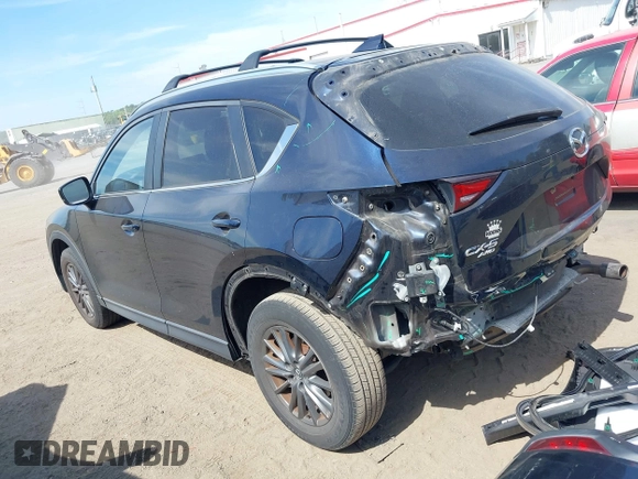 2017 Mazda CX-5 Touring z VIN JM3KFBCL5H0133493, wystawiony jako IAAI lot #39666644 z przebiegiem 125 048 mil mil oraz . Historia ofert i sprzedaży dostępna na DreamBid. Obrazek 3.