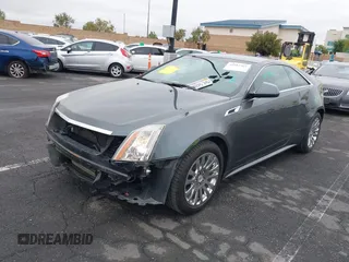 2011 Cadillac CTS Performance with VIN 1G6DJ1ED7B0126314, listed as a IAAI auction lot 42185363 with 80,676 mi miles and . Bid and sale history available at DreamBid. Image 2.