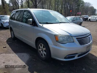 2012 Chrysler Town & Country Touring-L with VIN 2C4RC1CG1CR244943, listed as a IAAI auction lot 42081079 with 164,412 mi miles. Bid and sale history available at carsss.com. Image 1.