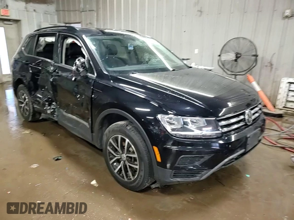 2021 Volkswagen Tiguan SE z VIN 3VV2B7AX1MM001377, wystawiony jako Copart lot #49893775 z przebiegiem 61 422 mil mil oraz Szkoda całkowita • Salvage title. Historia ofert i sprzedaży dostępna na DreamBid. Obrazek 13.