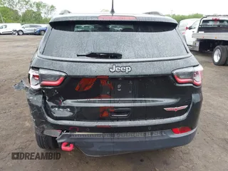 2019 Jeep Compass Trailhawk with VIN 3C4NJDDB7KT727762, listed as a IAAI auction lot 42299260 with 56,733 mi miles and . Bid and sale history available at DreamBid. Image 17.