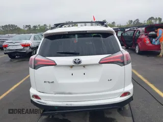 2017 Toyota RAV4 LE with VIN JTMZFREV9HJ704296, listed as a IAAI auction lot 41876996 with 85,605 mi miles and . Bid and sale history available at DreamBid. Image 16.