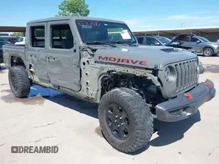 2021 Jeep Gladiator Mojave z VIN 1C6JJTEG8ML515686, wystawiony jako IAAI lot #42217590 z przebiegiem 38 506 mil mil oraz . Historia ofert i sprzedaży dostępna na DreamBid. Obrazek 1.