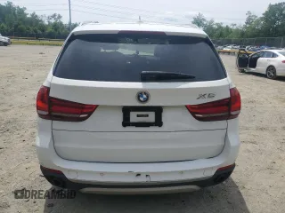 2015 BMW X5 xDrive35i z VIN 5UXKR0C53F0K61488, wystawiony jako Copart lot #57421645 z przebiegiem Nie podano mil oraz Szkoda całkowita • Salvage title. Historia ofert i sprzedaży dostępna na DreamBid. Obrazek 6.
