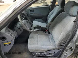 2005 Kia Optima LX z VIN KNAGD128155423463, wystawiony jako Copart lot #87441284 z przebiegiem 143 193 mil mil oraz Szkoda całkowita • Salvage title. Historia ofert i sprzedaży dostępna na DreamBid. Obrazek 7.