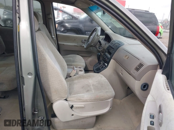 2005 Kia Sedona LX with VIN KNDUP132656734193, listed as a IAAI auction lot 41892342 with 91,768 mi miles. Bid and sale history available at carsss.com. Image 5.