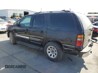 2001 GMC Yukon SLT with VIN 1GKEC13T31J198419, listed as a Copart auction lot 65012144 with 210,431 mi miles and Salvage Title. Bid and sale history available at carsss.com. Image 2.