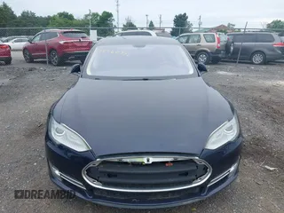 2014 Tesla Model S 60 with VIN 5YJSA1H19EFP32063, listed as a IAAI auction lot 42360872 with 103,495 mi miles and . Bid and sale history available at DreamBid. Image 12.