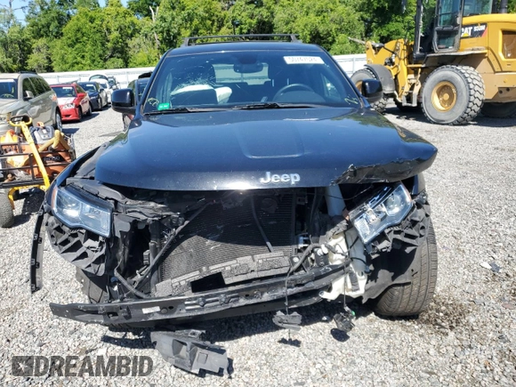 2017 Jeep Grand Cherokee Laredo with VIN 1C4RJEAG9HC780281, listed as a Copart auction lot 50747024 with 100,446 mi miles and Salvage title. Bid and sale history available at DreamBid. Image 5.