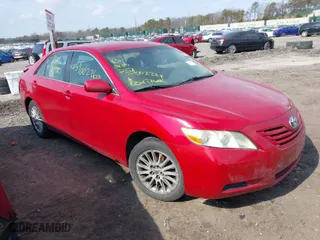 2007 Toyota Camry CE with VIN 4T1BE46K57U087077, listed as a IAAI auction lot 41727602 with 999,999 mi miles. Bid and sale history available at carsss.com. Image 1.