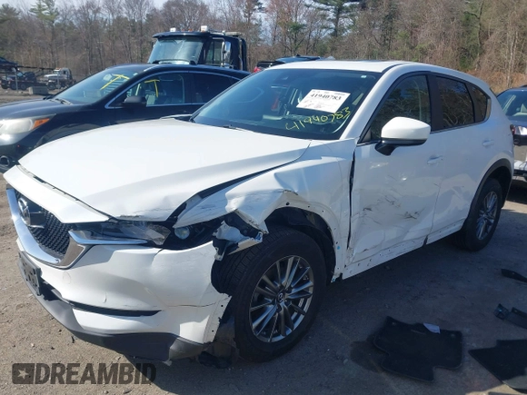 2017 Mazda CX-5 Touring z VIN JM3KFBCL8H0214052, wystawiony jako IAAI lot #41940783 z przebiegiem 120 083 mil mil oraz . Historia ofert i sprzedaży dostępna na DreamBid. Obrazek 16.