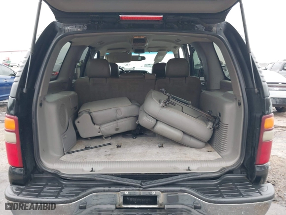 2003 Chevrolet Tahoe LS with VIN 1GNEC13Z73R243308, listed as a IAAI auction lot 41510266 with 246,378 mi miles. Bid and sale history available at carsss.com. Image 16.