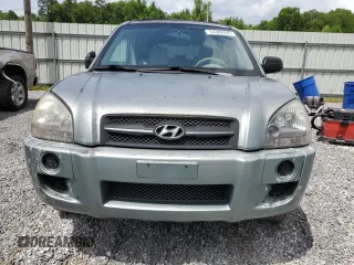 2005 Hyundai Tucson GL with VIN KM8JM12B05U148660, listed as a Copart auction lot 54302805 with 257,233 mi miles and Salvage title. Bid and sale history available at DreamBid. Image 5.
