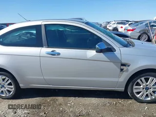 2008 Ford Focus SE with VIN 1FAHP33N48W114038, listed as a IAAI auction lot 41533744 with 143,065 mi miles. Bid and sale history available at carsss.com. Image 12.
