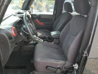 2013 Jeep Wrangler Sport z VIN 1C4AJWAG5DL671491, wystawiony jako Copart lot #59306745 z przebiegiem 111 778 mil mil oraz Szkoda całkowita • Salvage title. Historia ofert i sprzedaży dostępna na DreamBid. Obrazek 7.