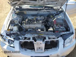 2006 Nissan Sentra S z VIN 3N1CB51D96L461993, wystawiony jako Copart lot #57934545 z przebiegiem 191 115 mil mil oraz Szkoda całkowita • Salvage title. Historia ofert i sprzedaży dostępna na DreamBid. Obrazek 11.