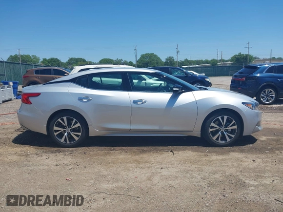 2016 Nissan Maxima SV z VIN 1N4AA6AP4GC434730, wystawiony jako IAAI lot #42231308 z przebiegiem 42 239 mil mil oraz . Historia ofert i sprzedaży dostępna na DreamBid. Obrazek 13.