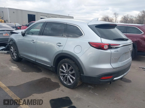 2021 Mazda CX-9 Grand Touring with VIN JM3TCBDY8M0515065, listed as a IAAI auction lot 41359765 with 80,221 mi miles and . Bid and sale history available at carsss.com. Image 3.