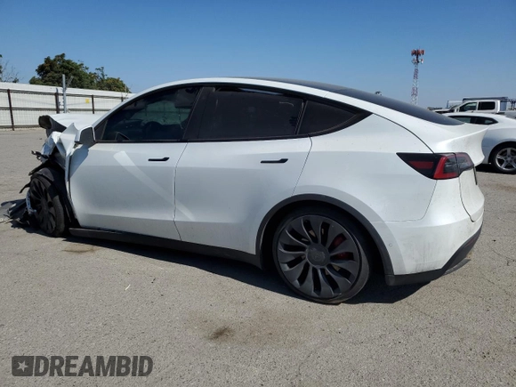 2022 Tesla Model Y Performance with VIN 7SAYGDEF9NF392197, listed as a Copart auction lot 57259105 with 43,400 mi miles and Salvage title. Bid and sale history available at DreamBid. Image 2.