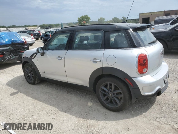 2014 MINI Countryman S with VIN WMWZC5C55EWM18087, listed as a Copart auction lot 68661614 with Not provided miles and Salvage title. Bid and sale history available at DreamBid. Image 2.