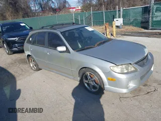 2002 Mazda Protege z VIN JM1BJ246721516577, wystawiony jako IAAI lot #41228198 z przebiegiem 464 778 mil mil oraz . Historia ofert i sprzedaży dostępna na DreamBid. Obrazek 1.