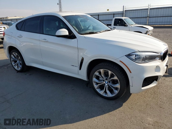 2018 BMW X6 xDrive35i with VIN 5UXKU2C52J0Z61957, listed as a Copart auction lot 73596543 with 87,119 mi miles. Bid and sale history available at carsss.com. Image 4.