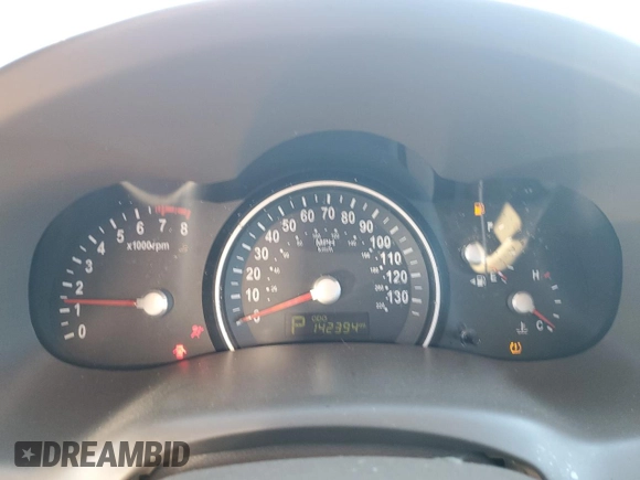 2011 Kia Sedona LX with VIN KNDMG4C74B6370803, listed as a Copart auction lot 77228344 with 142,394 mi miles and Salvage Title. Bid and sale history available at DreamBid. Image 9.