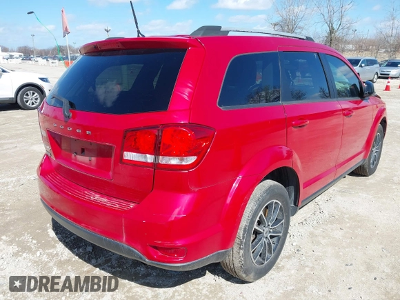 2019 Dodge Journey SE with VIN 3C4PDCBB9KT738520, listed as a IAAI auction lot 41876483 with 79,515 mi miles and . Bid and sale history available at DreamBid. Image 4.