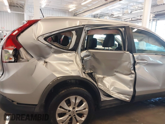 2013 Honda CR-V EX-L z VIN 5J6RM4H7XDL044025, wystawiony jako IAAI lot #41629806 z przebiegiem 264 710 mil mil oraz . Historia ofert i sprzedaży dostępna na DreamBid. Obrazek 6.