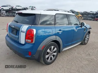 2017 MINI Countryman Cooper with VIN WMZYS7C3XH3E06893, listed as a IAAI auction lot 41729256 with 74,543 mi miles and . Bid and sale history available at DreamBid. Image 4.