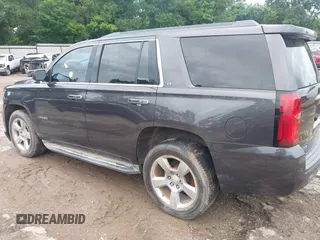 2015 Chevrolet Tahoe LT with VIN 1GNSCBKC4FR183580, listed as a IAAI auction lot 42318000 with Not provided miles and . Bid and sale history available at DreamBid. Image 3.