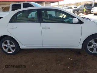2011 Toyota Corolla L with VIN 2T1BU4EE3BC604630, listed as a IAAI auction lot 41986565 with 132,325 mi miles. Bid and sale history available at carsss.com. Image 13.