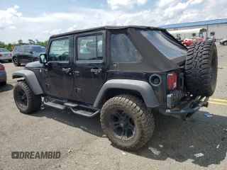 2015 Jeep Wrangler Unlimited Sport with VIN 1C4BJWDG1FL668395, listed as a Copart auction lot 64035035 with 79,972 mi miles and Salvage title. Bid and sale history available at DreamBid. Image 2.